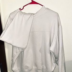 White mock neck sweatshirt